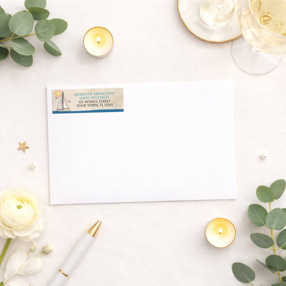 Rustic Sailboat Nautical Address Label shown on a white envelope with wedding and shower supplies