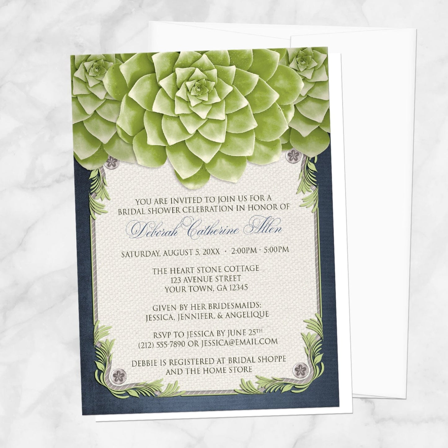 Bridal shower invitation with green succulents with navy blue and beige, displayed with a white envelope on a marble surface