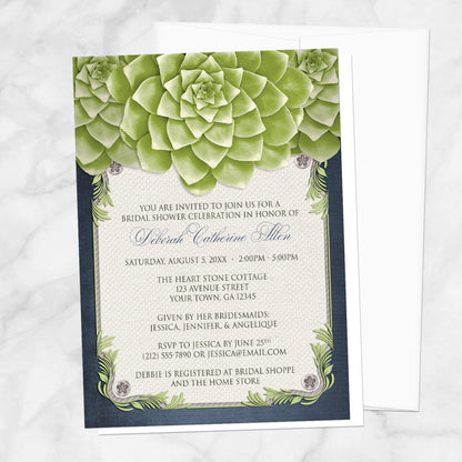 Bridal shower invitation with green succulents with navy blue and beige, displayed with a white envelope on a marble surface