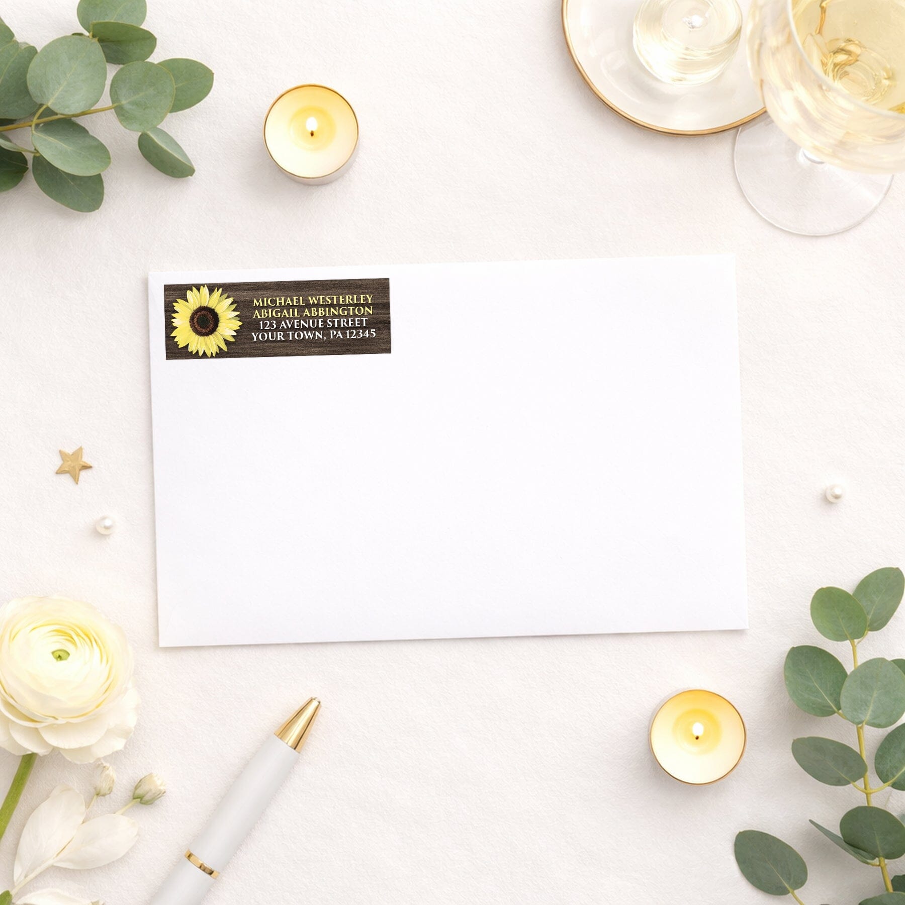 Rustic Sunflower Brown Wood Address Label shown on a white envelope with wedding and shower supplies