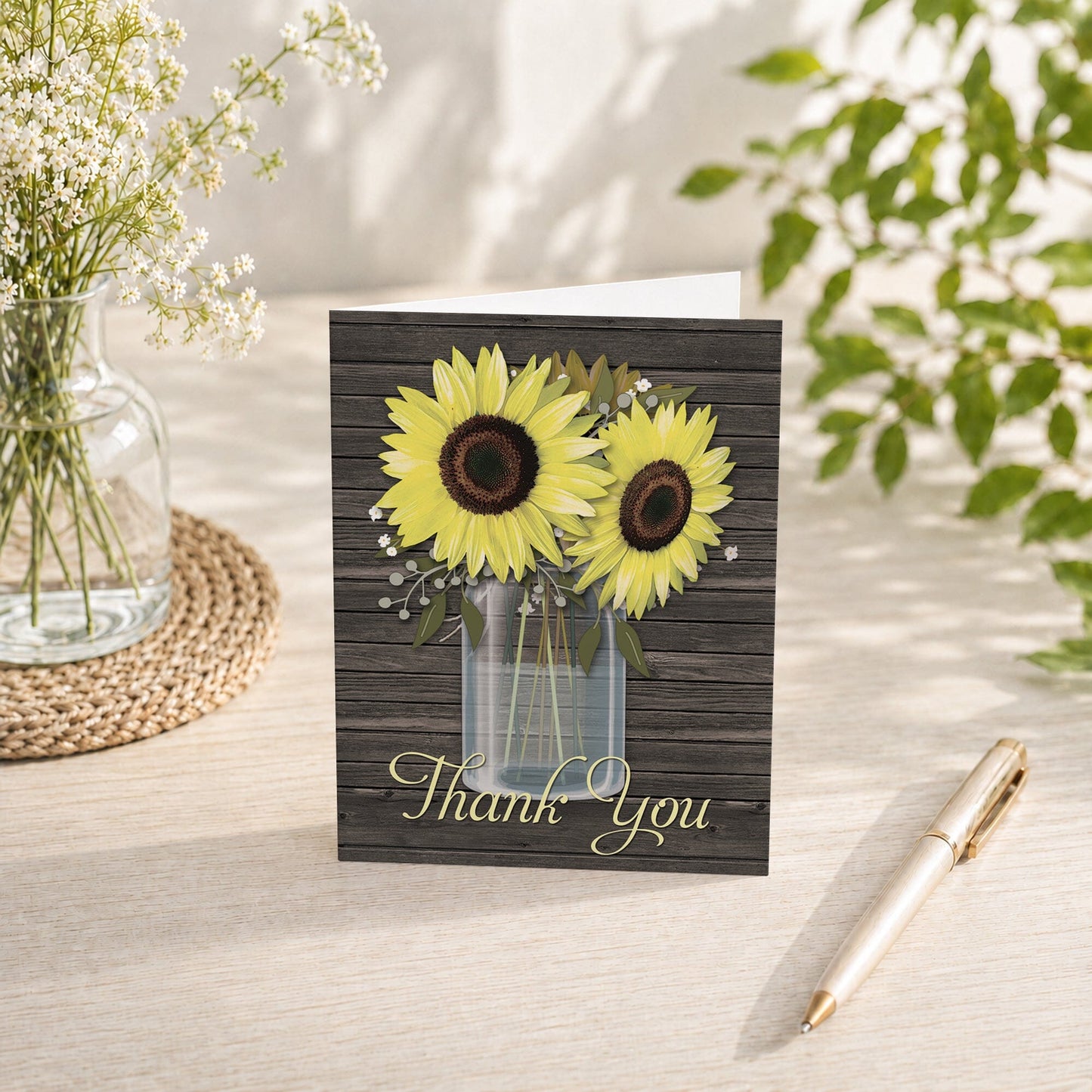 Rustic Sunflower Wood Mason Jar Thank You Card shown on a tabletop with a vase, summer flowers, and a pen.