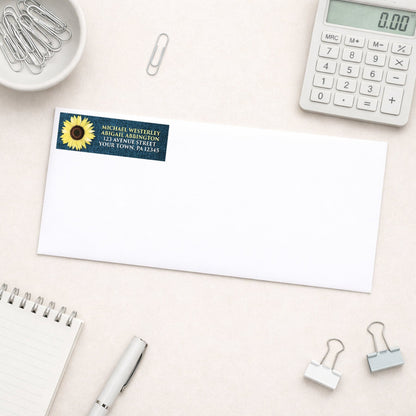 Rustic Sunflower and Denim Address Label shown on a white envelope with everyday office supplies