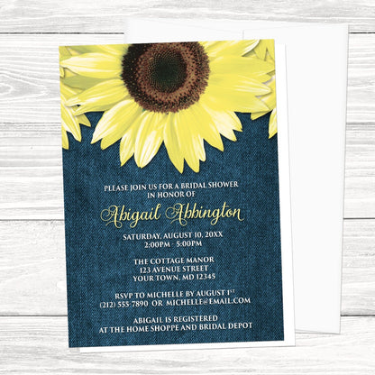 Bridal Shower invitation with large yellow sunflowers and blue denim, displayed with a white envelope on a white wood surface
