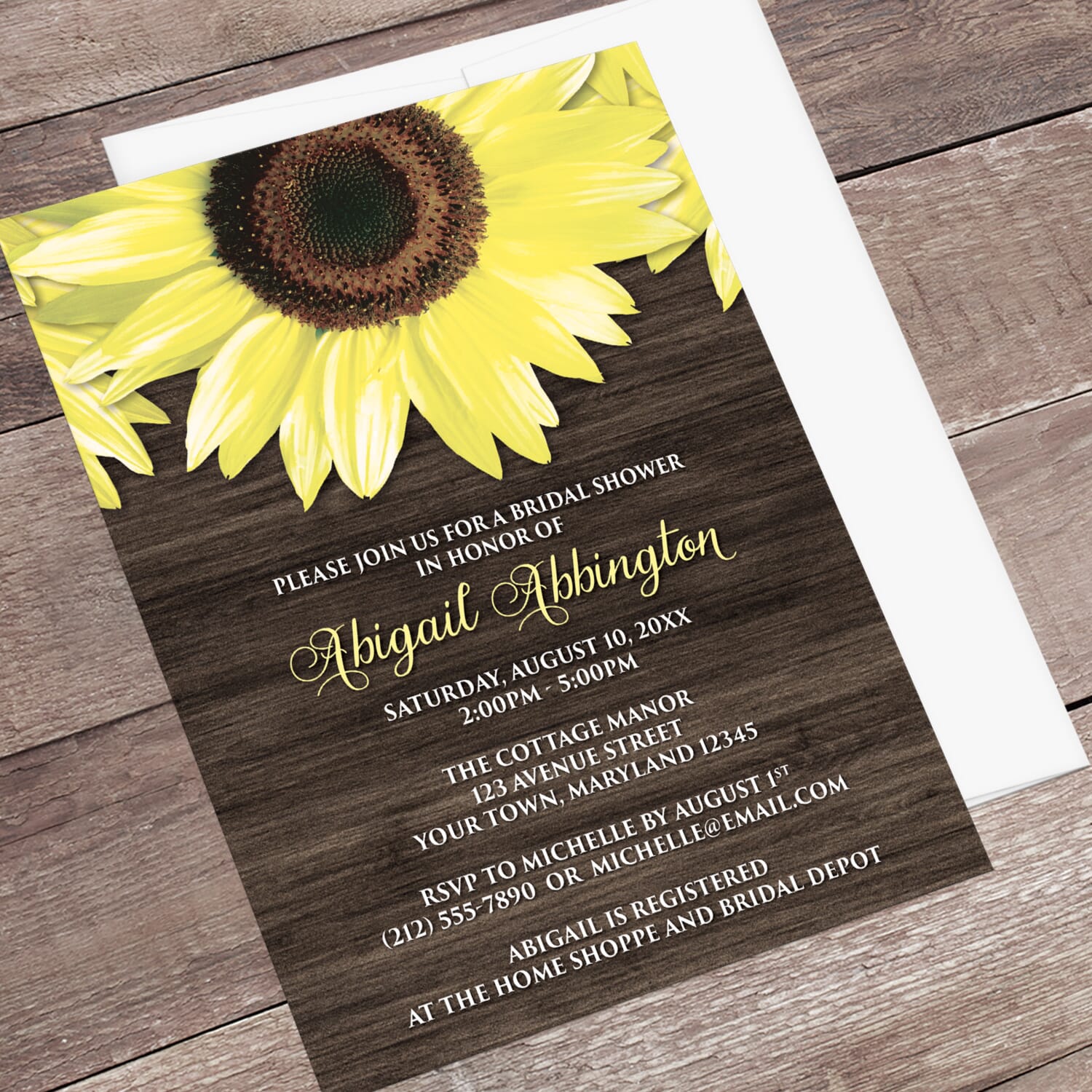 Sunflower-themed bridal shower invitation on a wooden surface