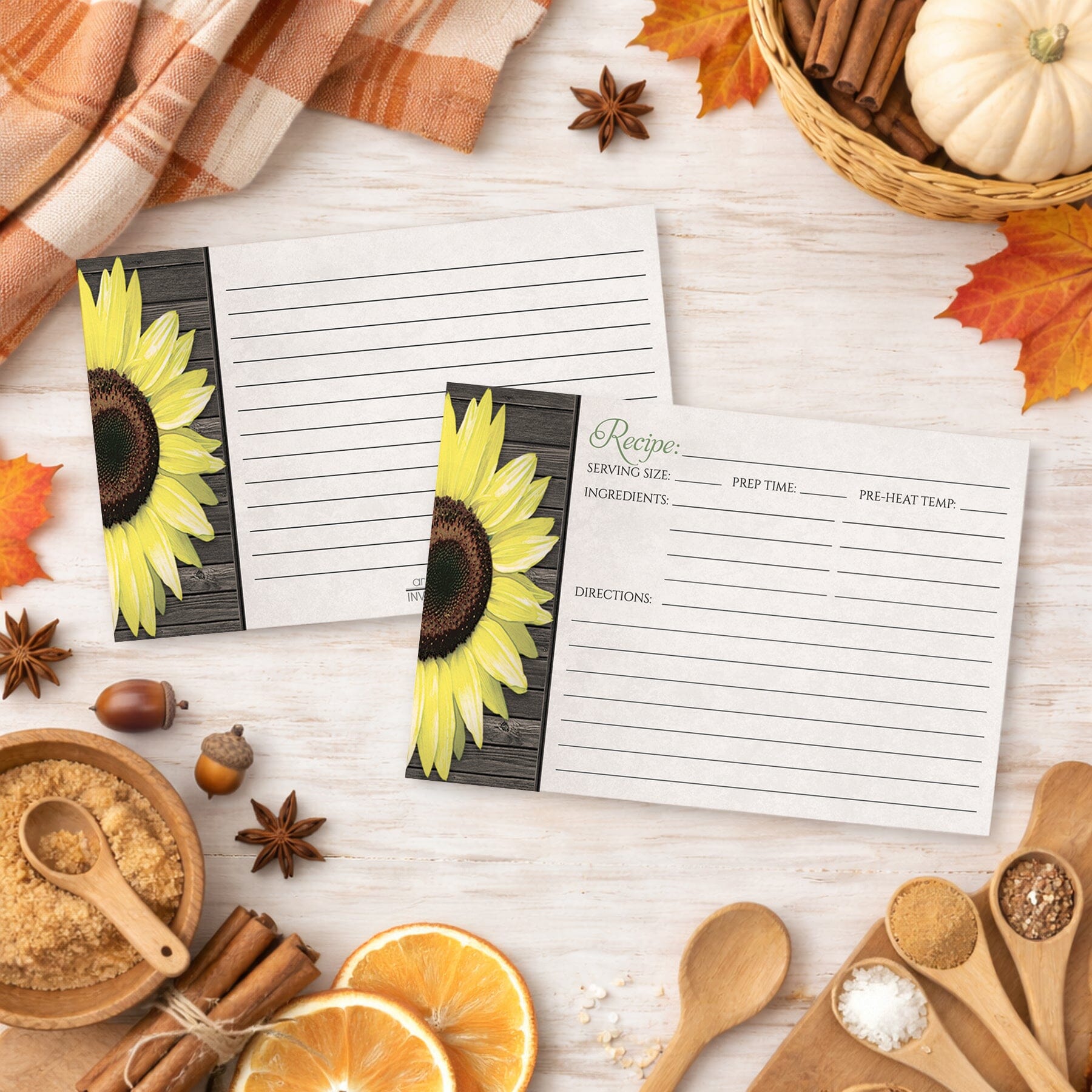 A set of Rustic Sunflower and Wood Recipe Cards on a wooden surface with autumn-themed items and fall ingredients.
