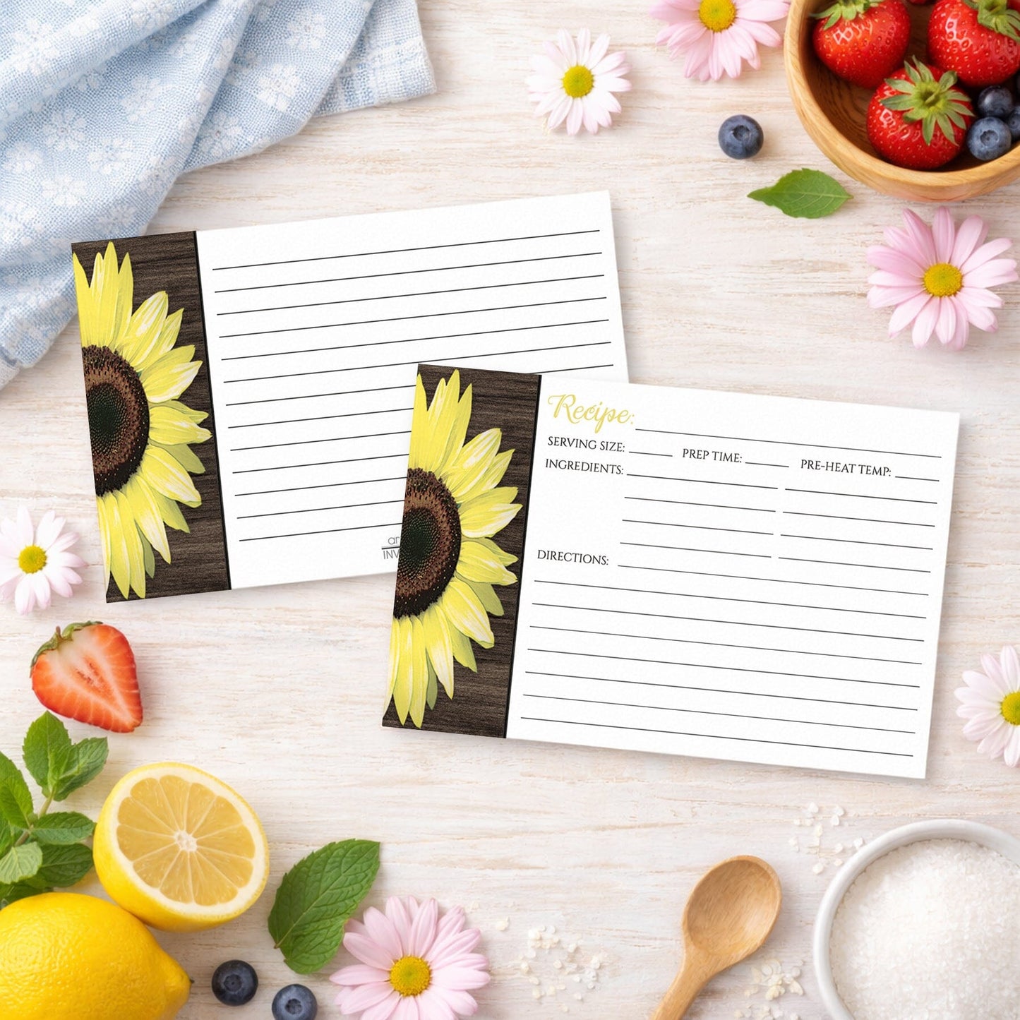 Two Rustic Sunflower and Wood White Recipe Cards on a wooden surface with summer fruits and flowers.