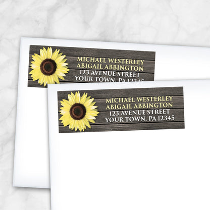 2 Rustic Sunflower on Wood Address Labels shown on white envelopes on a marble surface