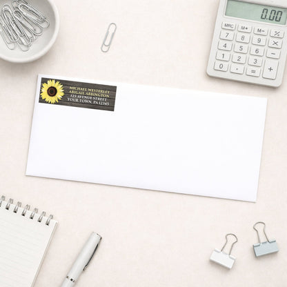 Rustic Sunflower on Wood Address Label shown on a white envelope with office supplies