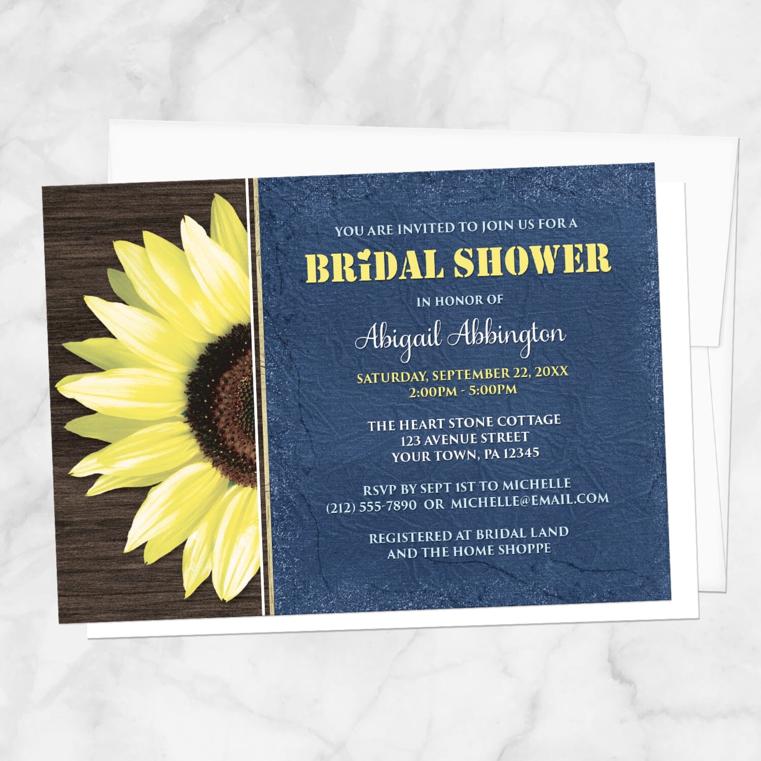 Rustic Sunflower with Blue Bridal Shower Invitation shown on a marble surface with a white envelope.