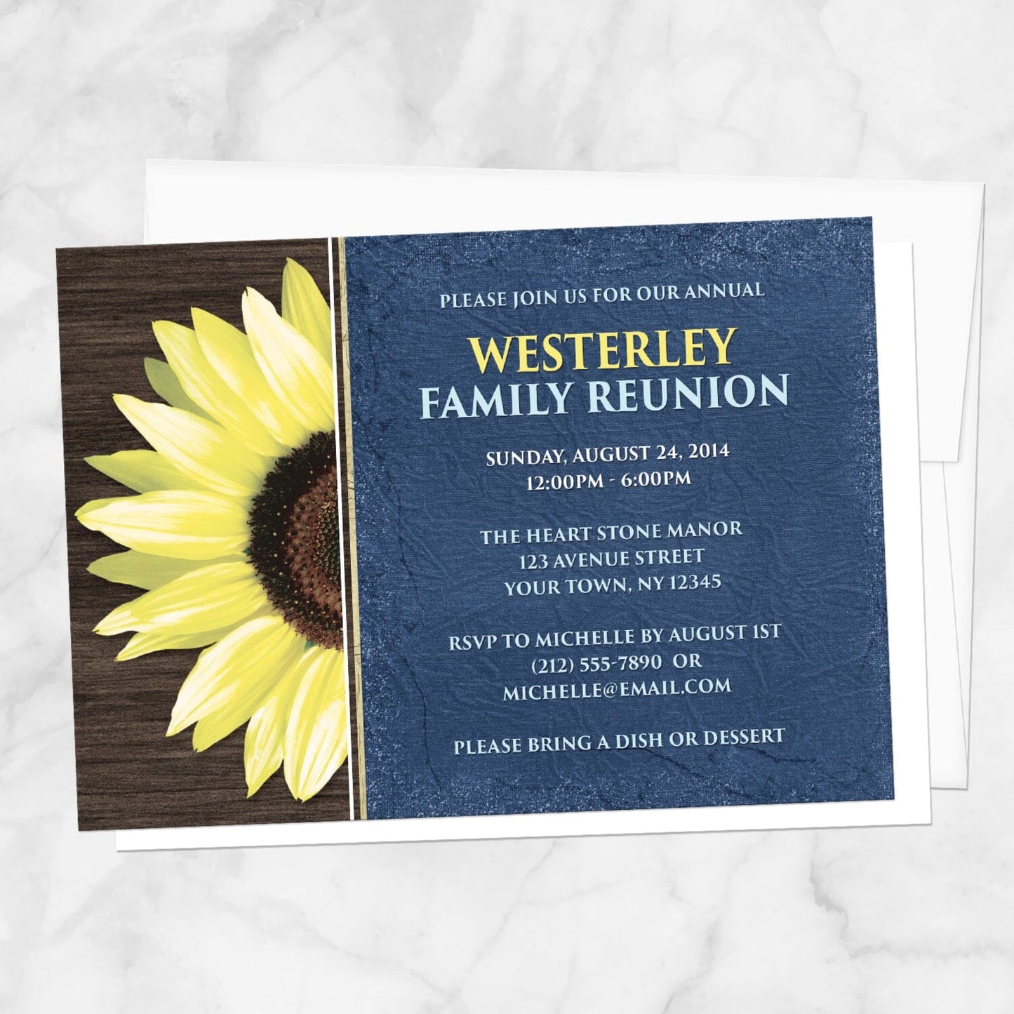 Rustic Sunflower with Blue Family Reunion Invitation shown on a marble surface with a white envelope.