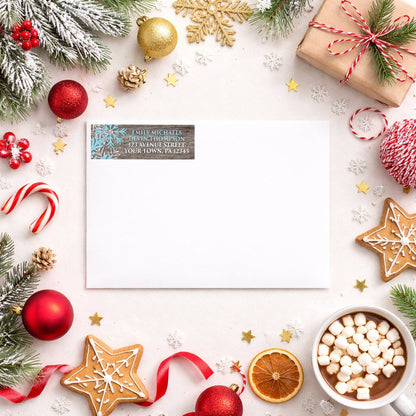 Rustic Winter Wood Blue Snowflake Address Label shown on a white envelope with Christmas holiday supplies