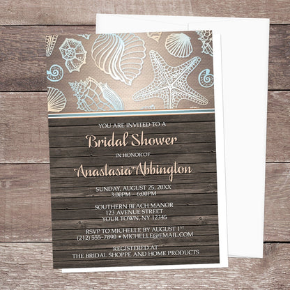 Rustic Wood Beach Seashell Bridal Shower Invitation shown on a wooden surface with a white envelope.