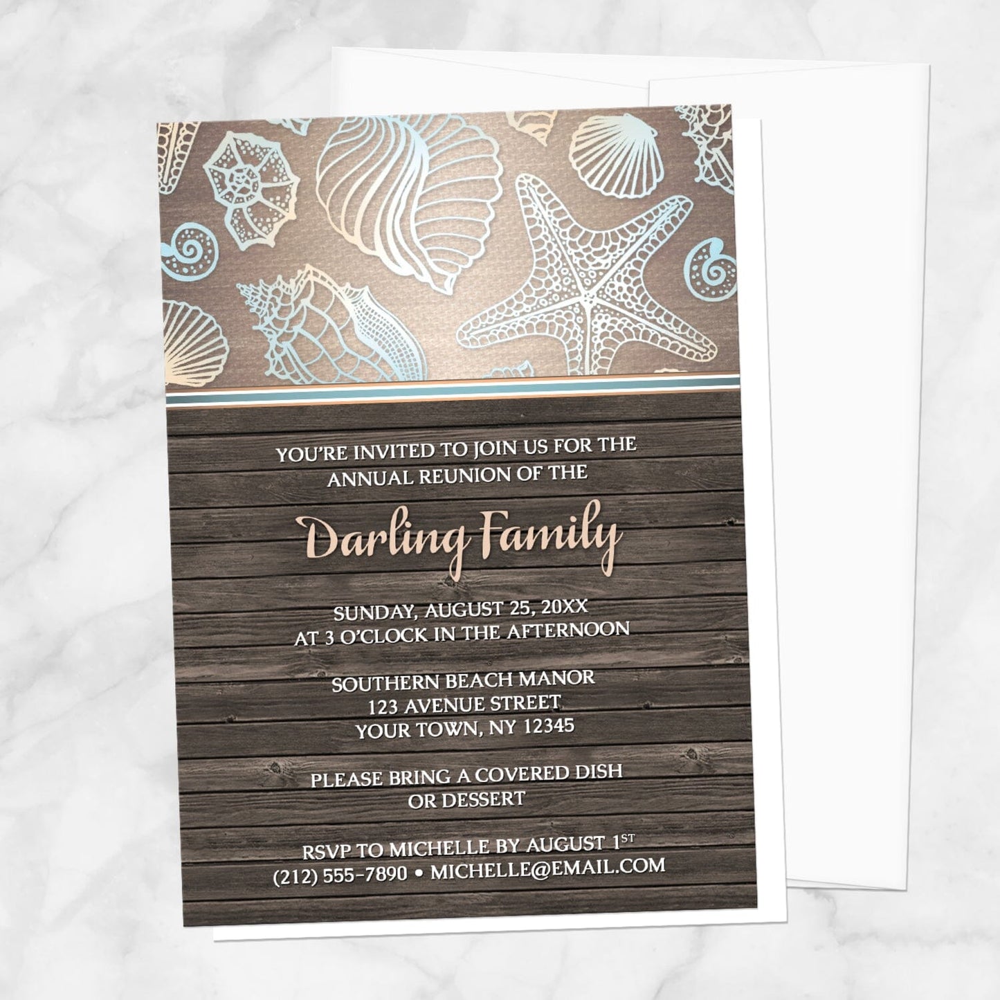 Rustic Wood Beach Seashell Family Reunion Invitation shown on a marble surface with a white envelope.