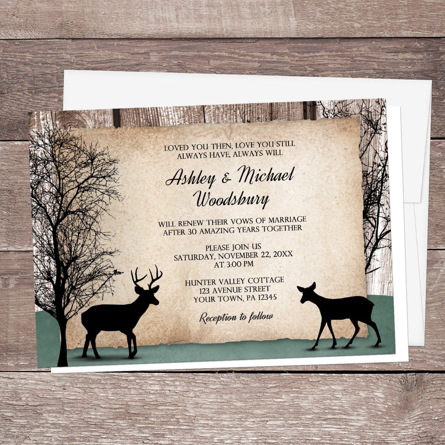 Rustic Woodsy Deer Vow Renewal Invitation shown on a brown wooden surface with a white envelope.