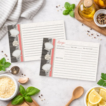 Set of Seashell Lace Wood and Sand Coral Beach Recipe Cards on a kitchen counter with ingredients.