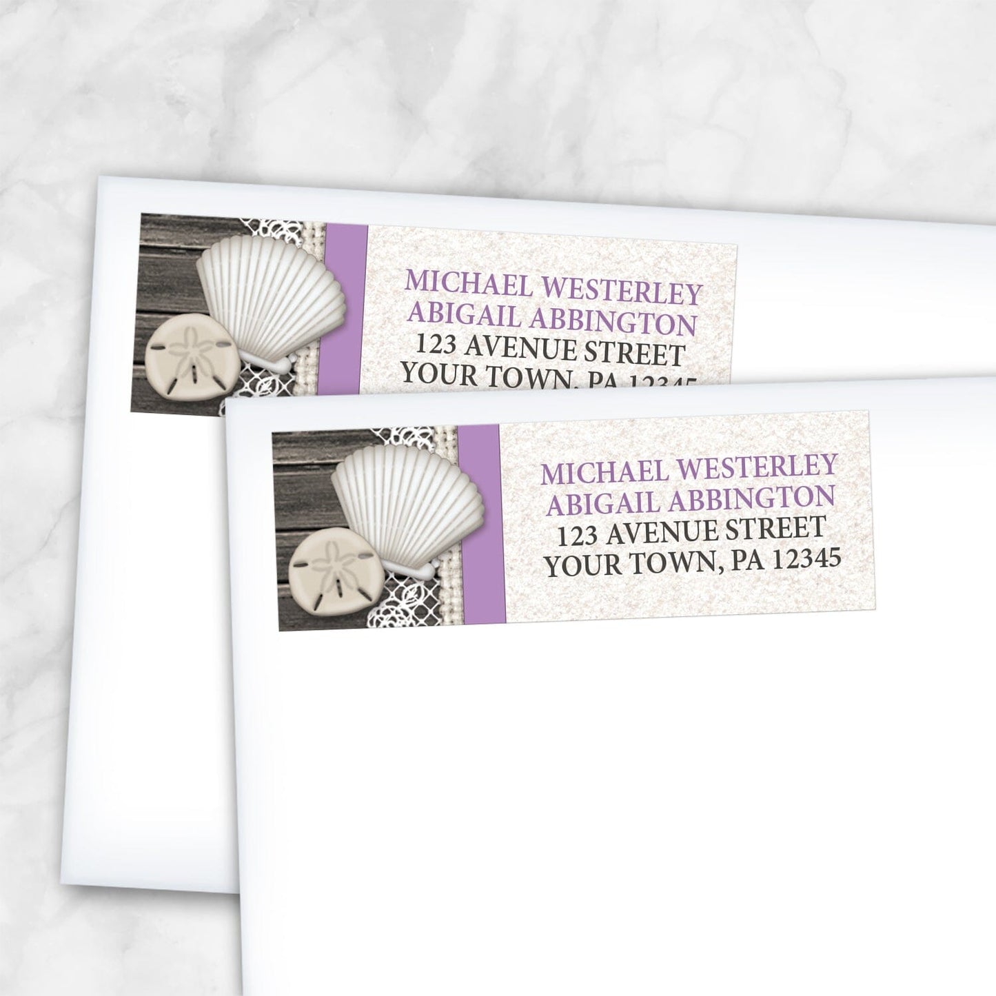 2 Seashell Lace Wood and Sand Purple Beach Address Labels shown on white envelopes on a marble surface