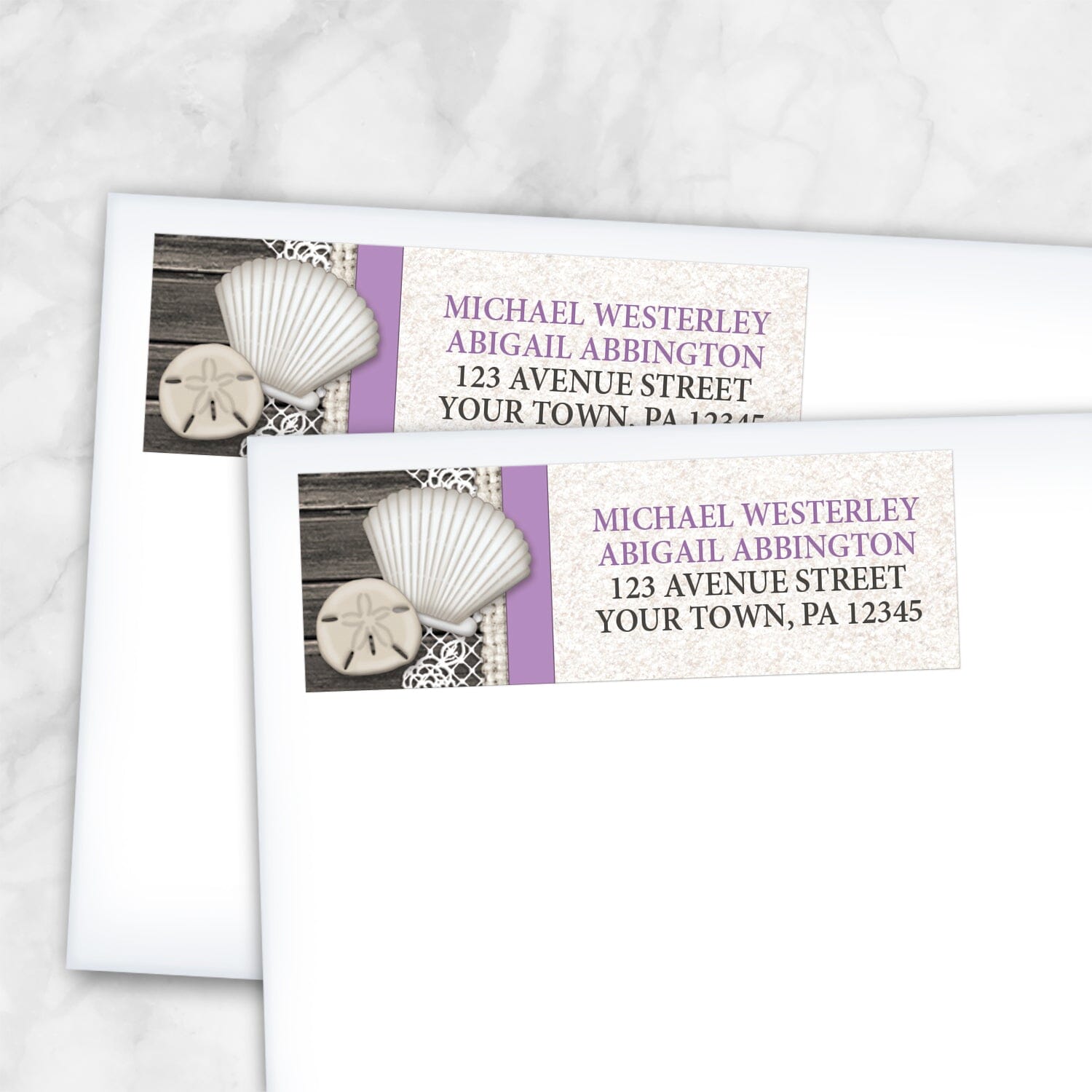 2 Seashell Lace Wood and Sand Purple Beach Address Labels shown on white envelopes on a marble surface