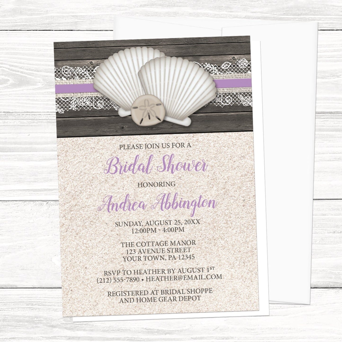 Seashell Lace Wood and Sand Purple Beach Bridal Shower Invitation shown on a light wood surface with a white envelope.