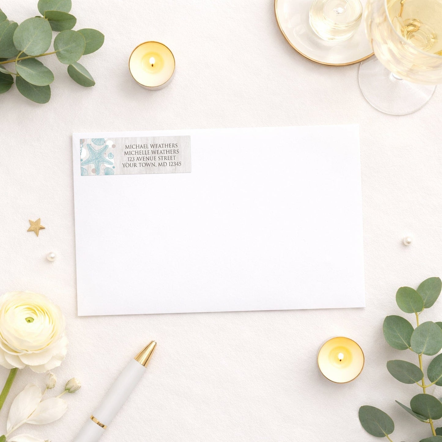 Seashell Whitewashed Wood Beach Address Label shown on a white envelope with wedding and bridal shower supplies