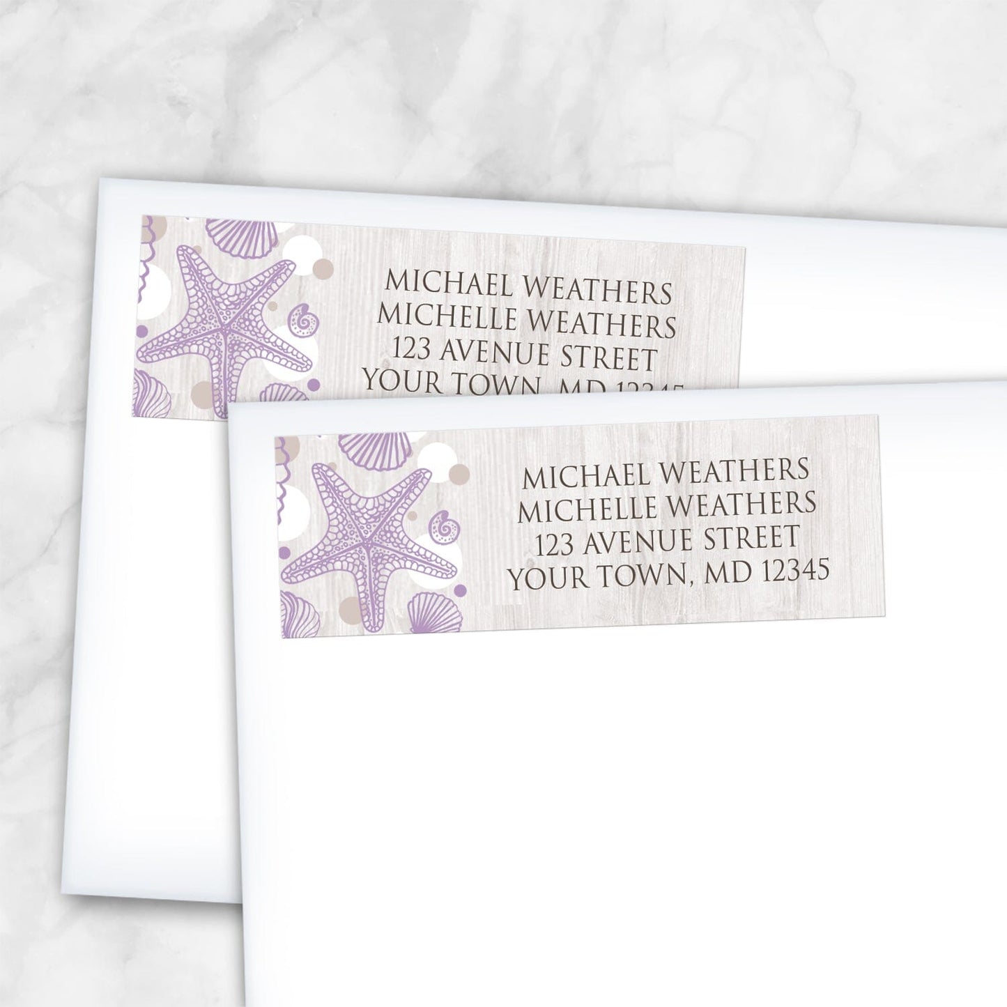 2 Seashell Whitewashed Wood Purple Beach Address Labels shown on white envelopes on a marble surface