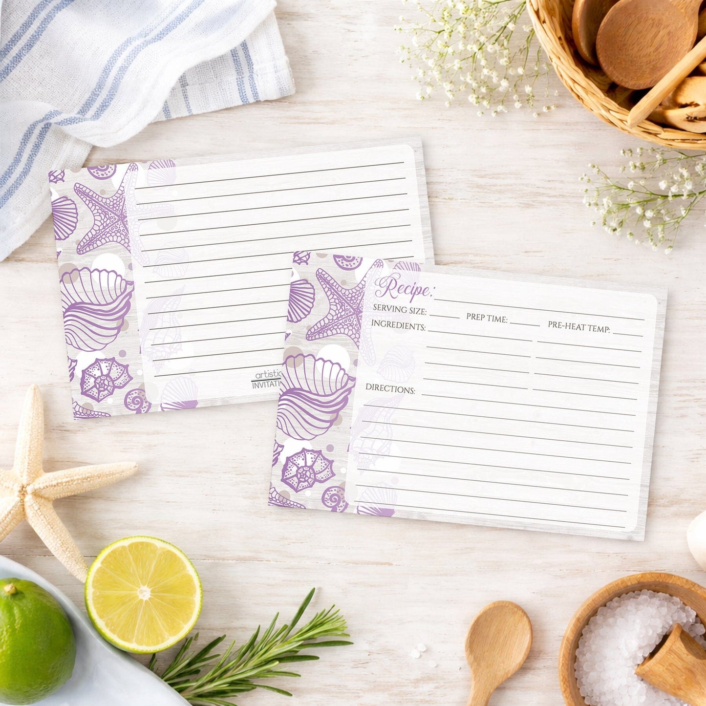 Set of Seashell Whitewashed Wood Purple Beach Recipe Cards on a wooden surface with beach house kitchen items.