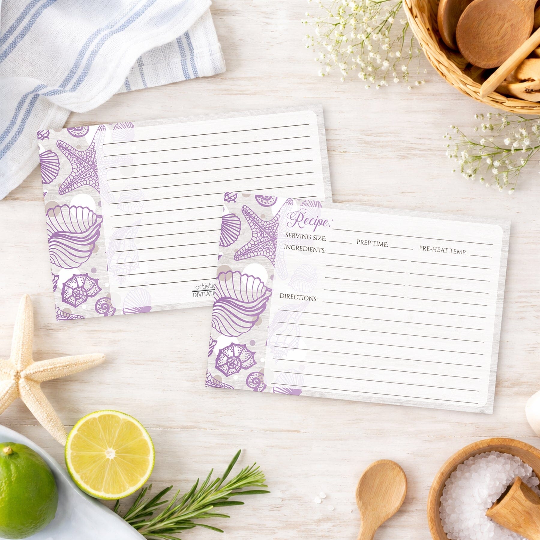 Set of Seashell Whitewashed Wood Purple Beach Recipe Cards on a wooden surface with beach house kitchen items.
