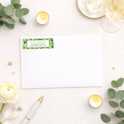 Shamrocks and 4-Leaf Clovers Address Label shown on a white envelope with wedding supplies