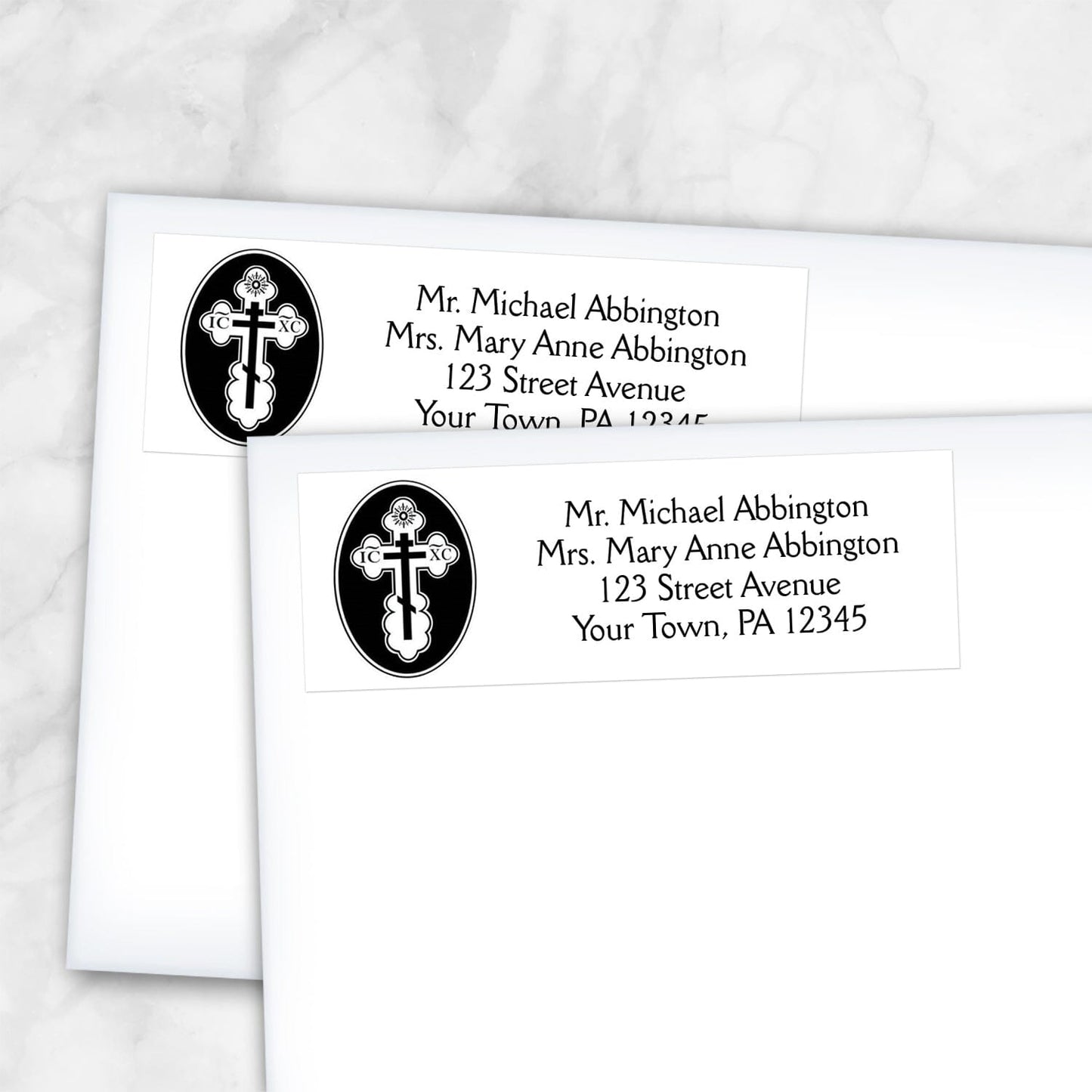 2 St. Olga Cross Orthodox Address Labels shown on white envelopes on a marble surface