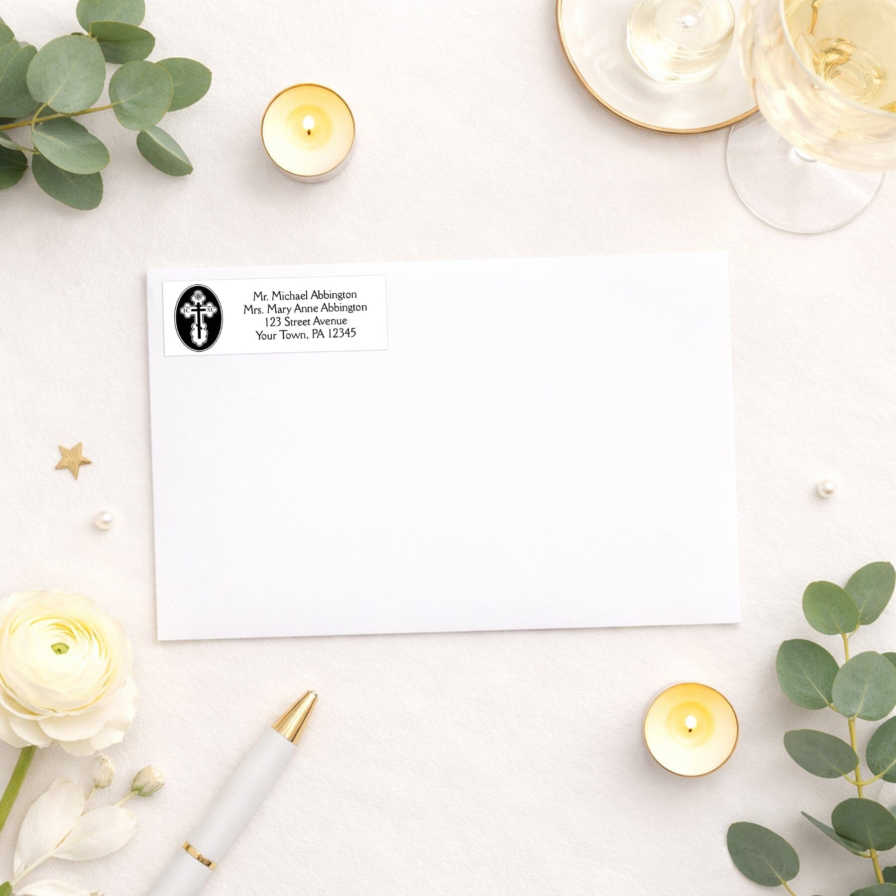St. Olga Cross Orthodox Address Label shown on a white envelope with wedding and shower supplies