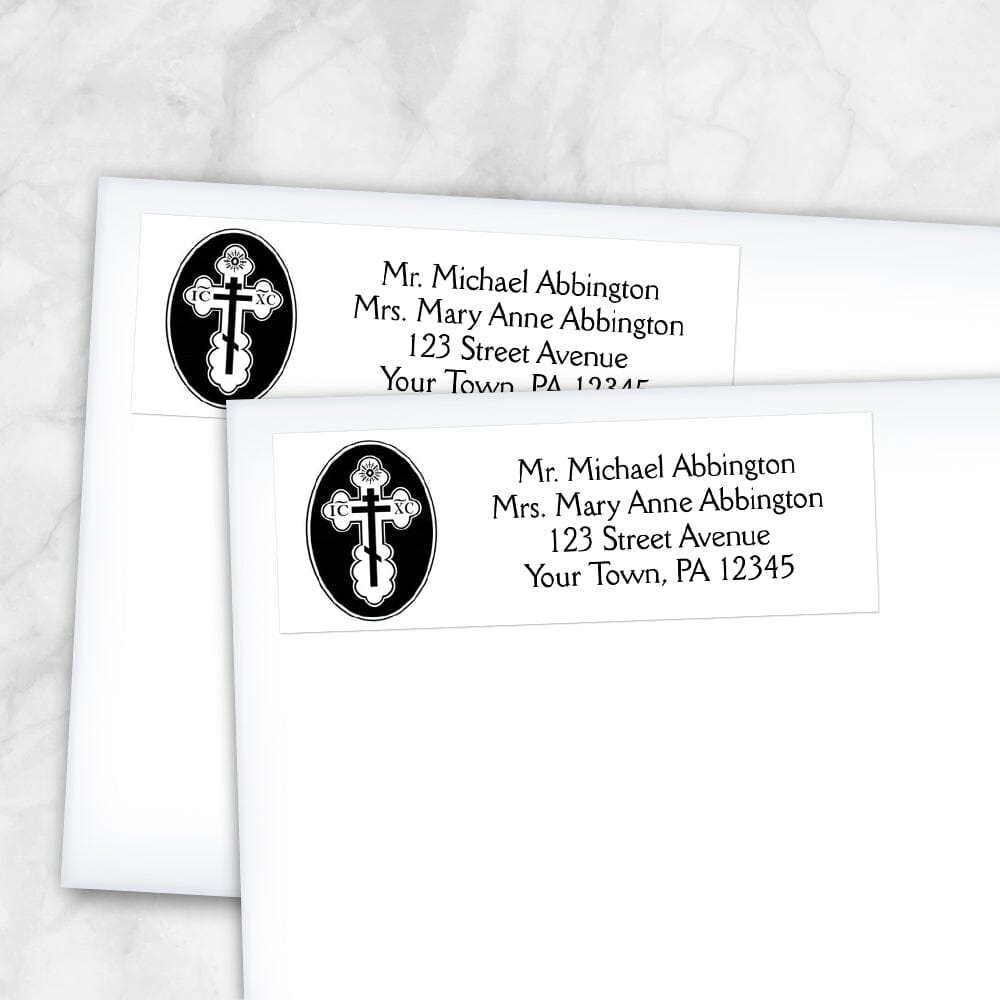 St. Olga Cross Orthodox Address Labels at Artistically Invited. These elegant address labels are designed with a beautiful St. Olga Cross design on the left with your personalized return address custom printed in black to the right over white. Image shows 2 address labels on envelopes.