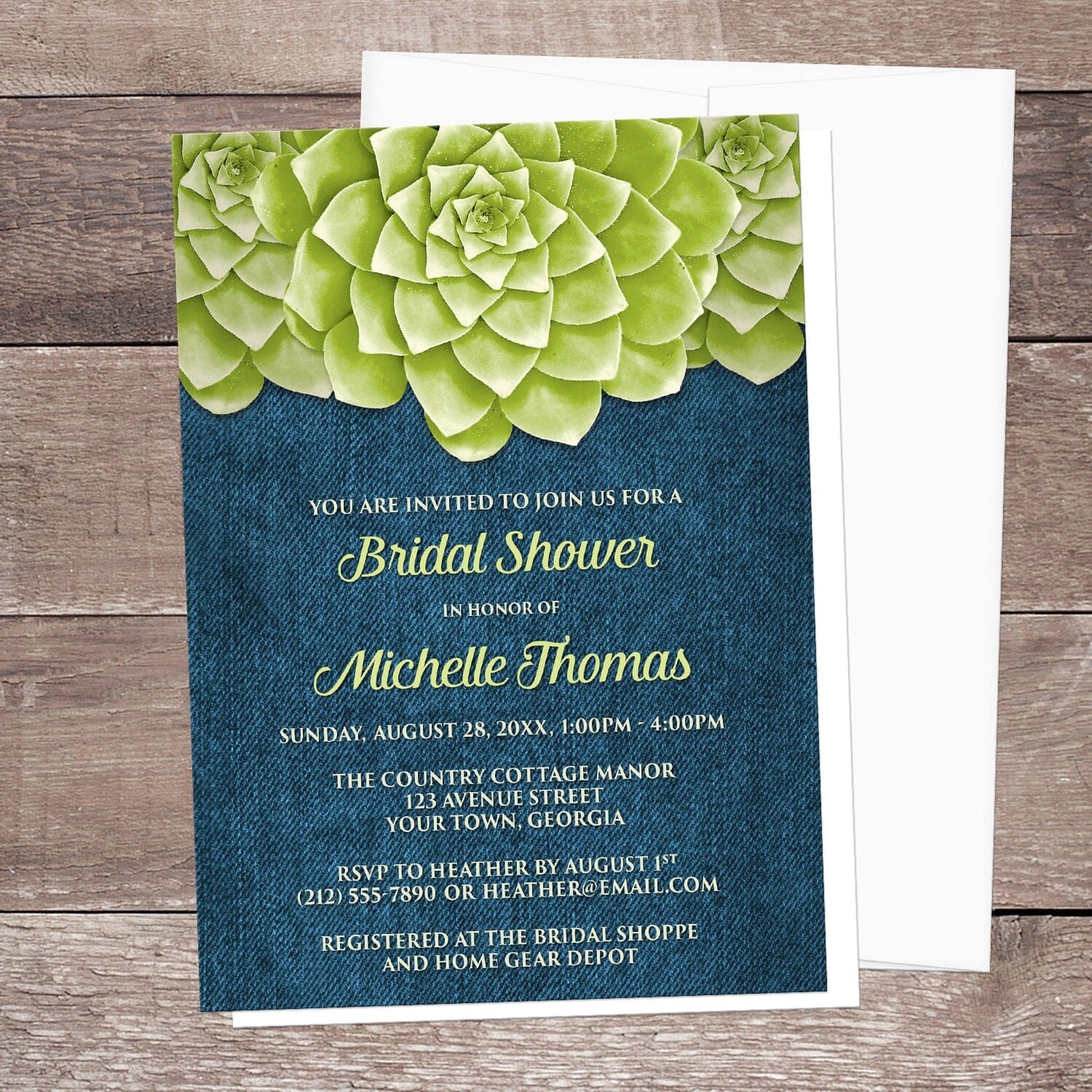 Succulent Green Blue Denim Bridal Shower Invitation shown on a wooden surface with a white envelope.