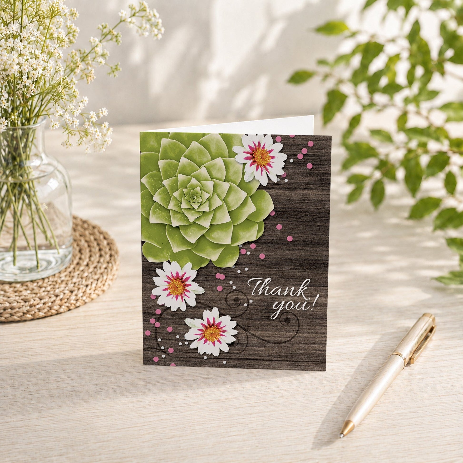 Succulent Rustic Floral Wood Thank You Card on a tabletop with a vase, spring and summer flowers, and a pen.