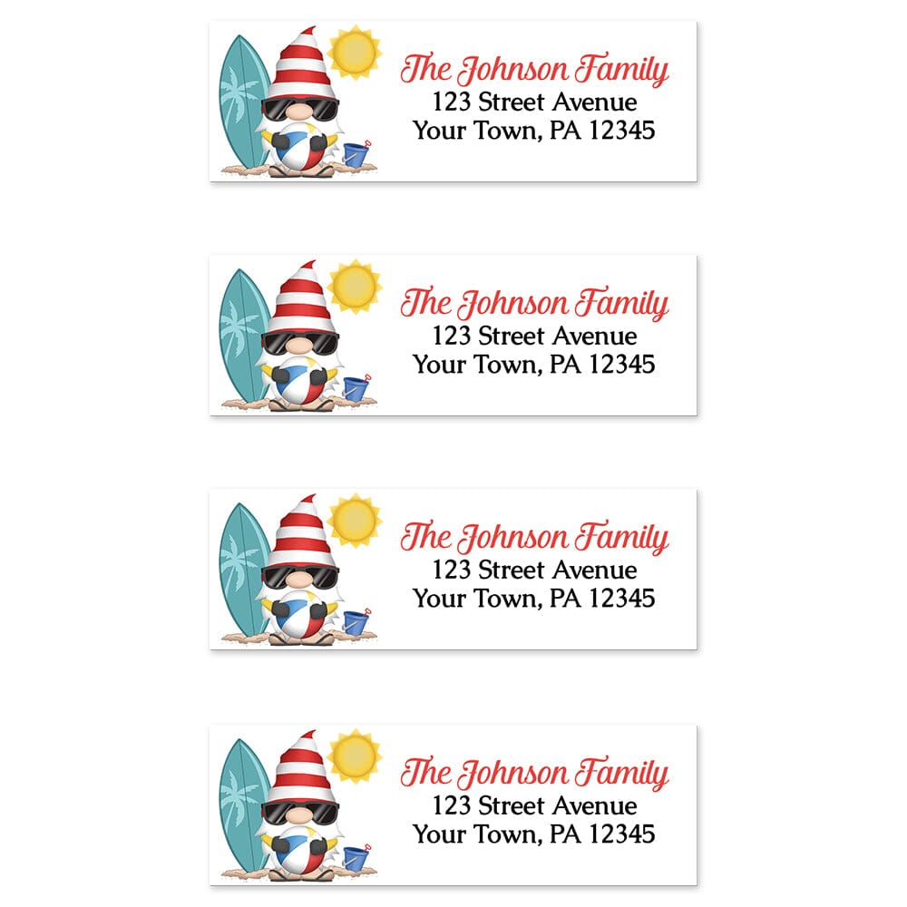 Summer Beach Gnome Address Labels at Artistically Invited. Sheet of 4 labels. These address labels are designed with an illustration of a cute gnome holding a beach ball with a surfboard and a bucket in the sand, and a sun above. Your personalized return address is custom printed in red and black over white to the right of the beach-themed gnome.