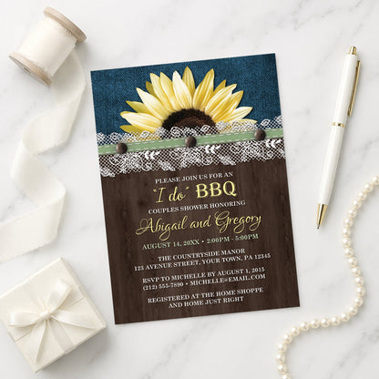 Sunflower Denim Wood Lace I Do BBQ Couples Shower Invitation shown on a marble surface with a white gift box, pen, ribbon, and pearls.