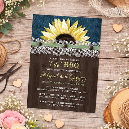 Sunflower Denim Wood Lace I Do BBQ Couples Shower Invitation shown on a wooden surface with spring and summer flowers, small wood hearts, lace, and twine.