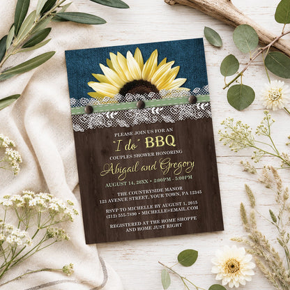 Sunflower Denim Wood Lace I Do BBQ Couples Shower Invitation shown on a light wooden surface with spring and summer plants.