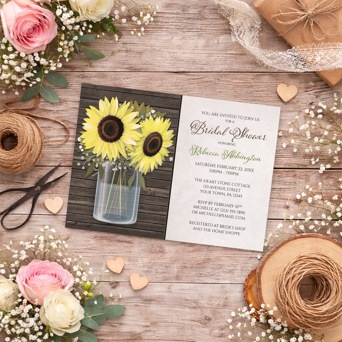 Sunflower Wood Mason Jar Rustic Bridal Shower Invitation shown on a country-inspired wooden surface with summer flowers, small wood hearts, lace ribbon, and twine.
