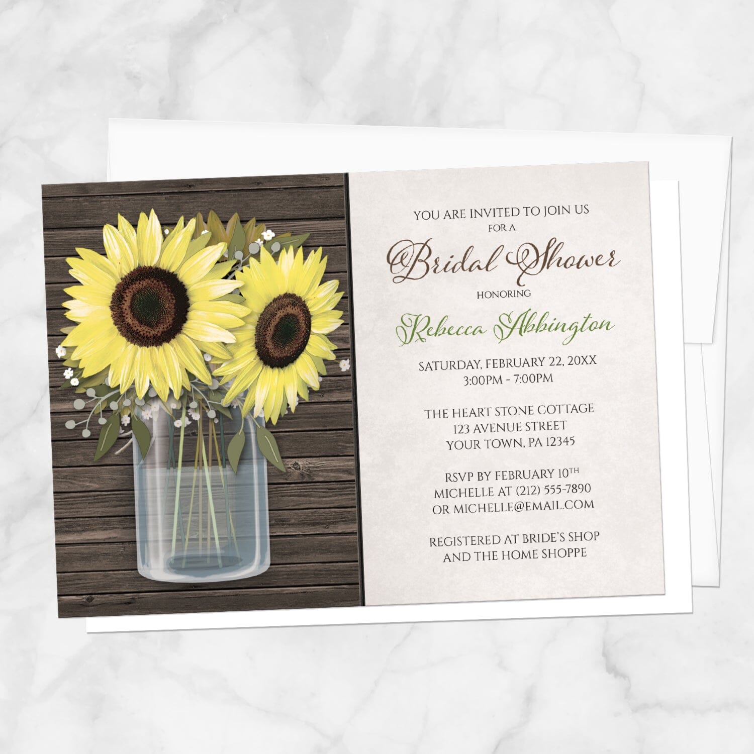 Sunflower Wood Mason Jar Rustic Bridal Shower Invitation shown on a marble surface with a white envelope.