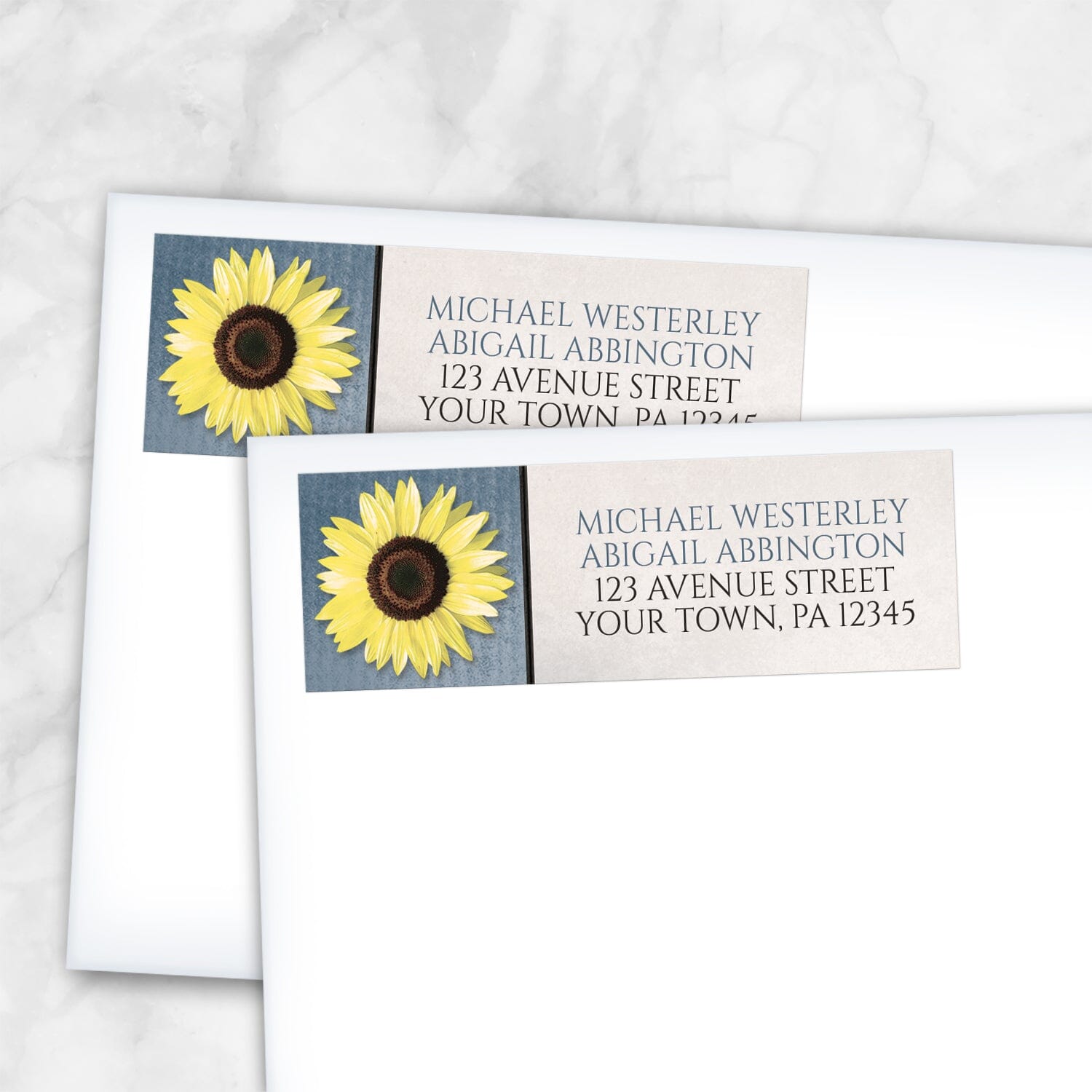 2 Sunflower and Blue Rustic Address Labels shown on white envelopes on a marble surface