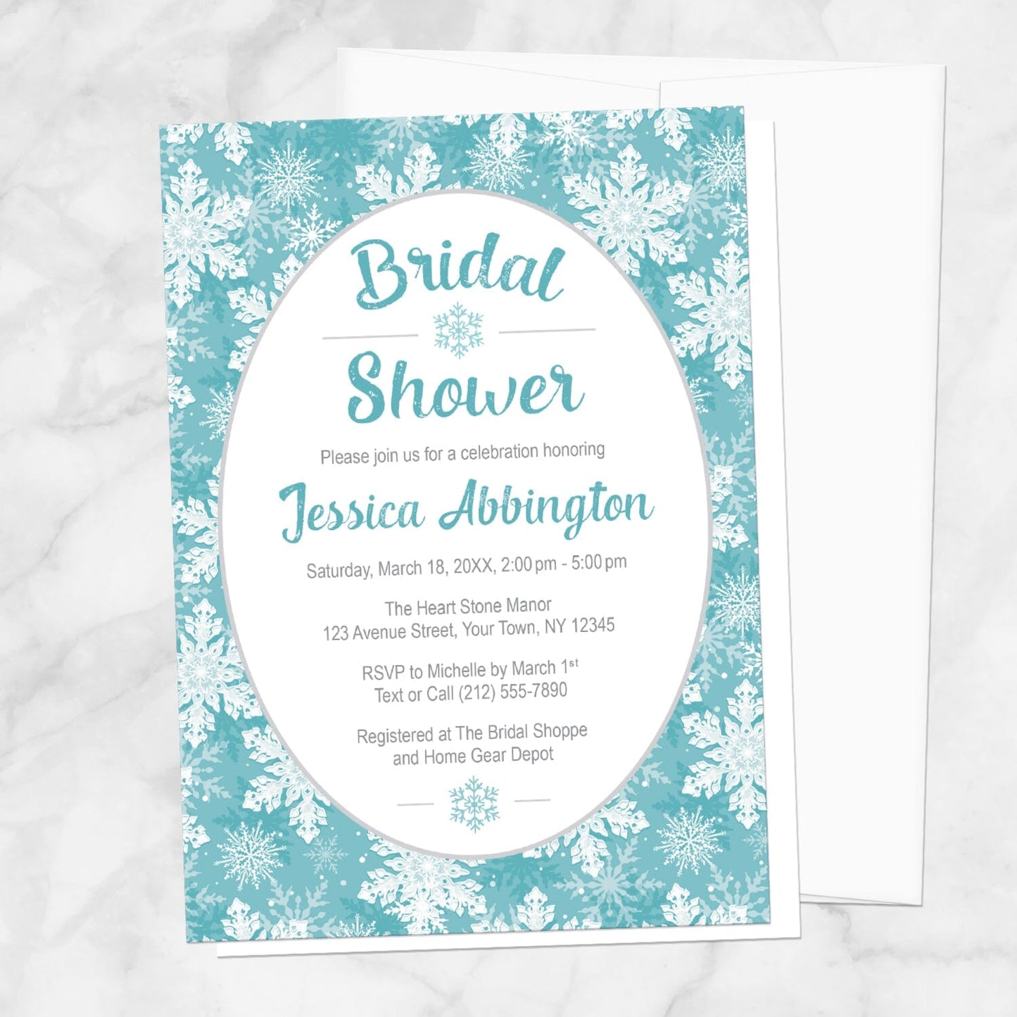 Teal Snowflake Bridal Shower Invitation shown on a marble surface with a white envelope.