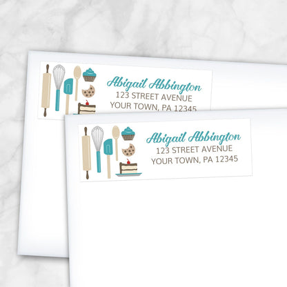 2 Turquoise Baking Address Labels shown on white envelopes on a marble surface