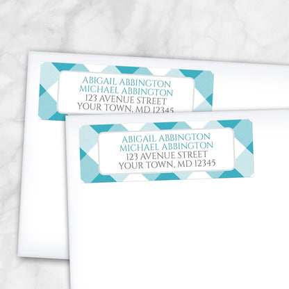 2 Turquoise Gingham Address Labels shown on white envelopes on a marble surface