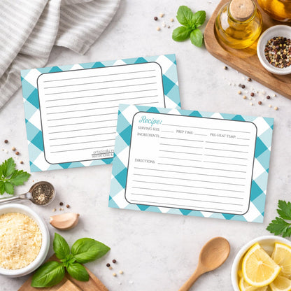 Two Turquoise Gingham Recipe Cards on a kitchen counter with ingredients.