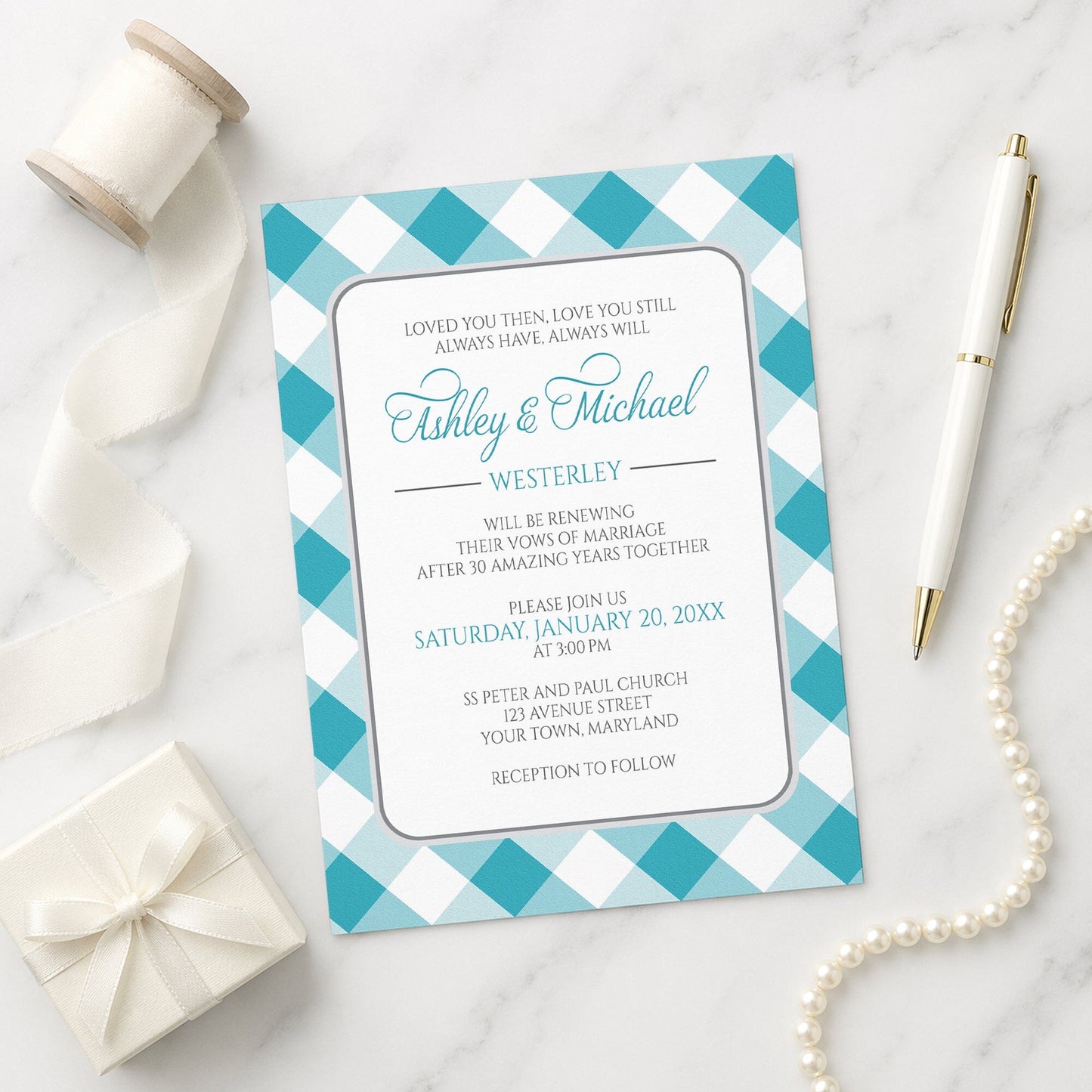 Turquoise Gingham Vow Renewal Invitation shown on a marble surface with a white gift box, pen, ribbon, and pearls.