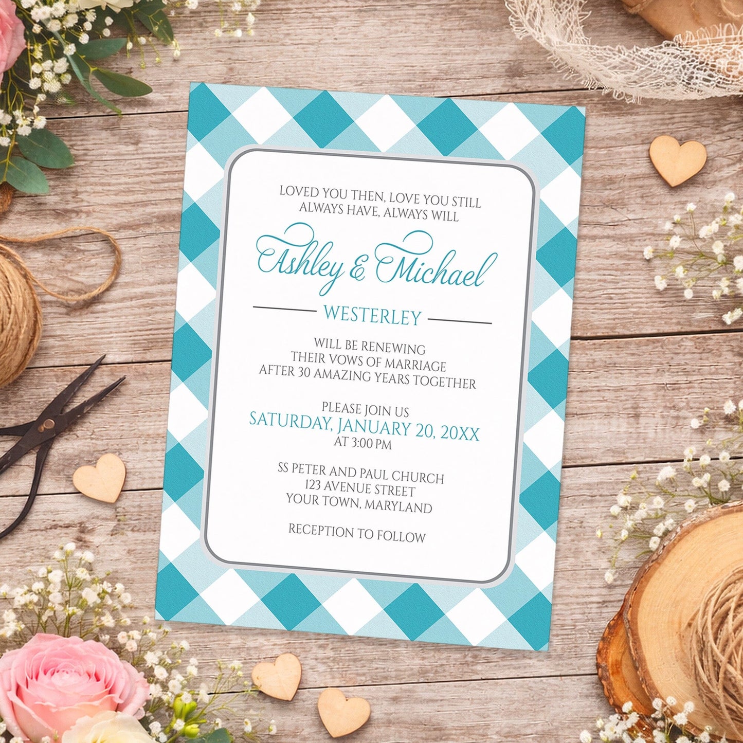 Turquoise Gingham Vow Renewal Invitation shown on a wooden surface with spring and summer flowers, small wood hearts, lace, and twine.