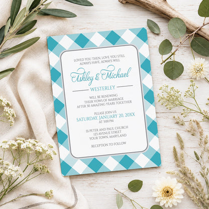 Turquoise Gingham Vow Renewal Invitation shown on a light wooden surface with spring and summer plants.