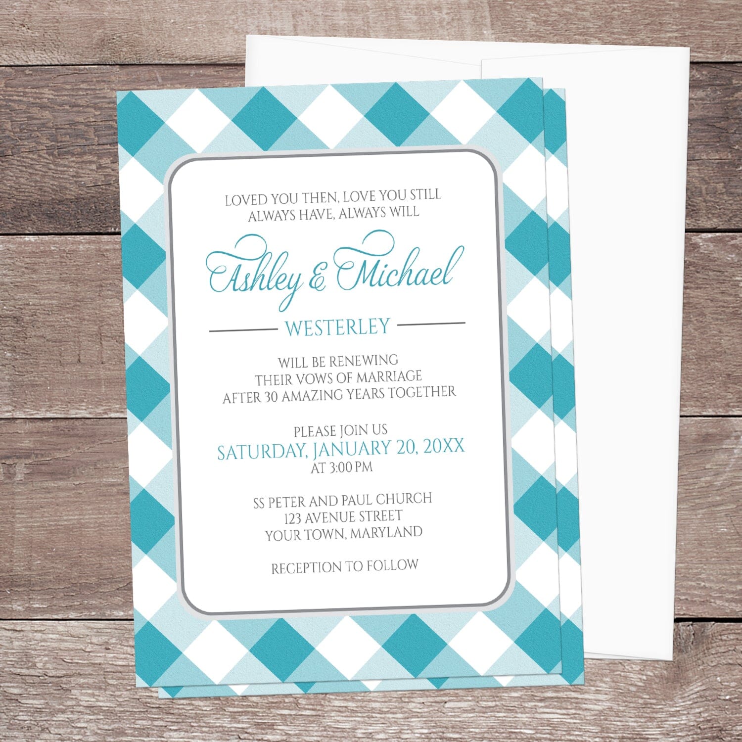 Turquoise Gingham Vow Renewal Invitation shown on a brown wood surface with a white envelope.