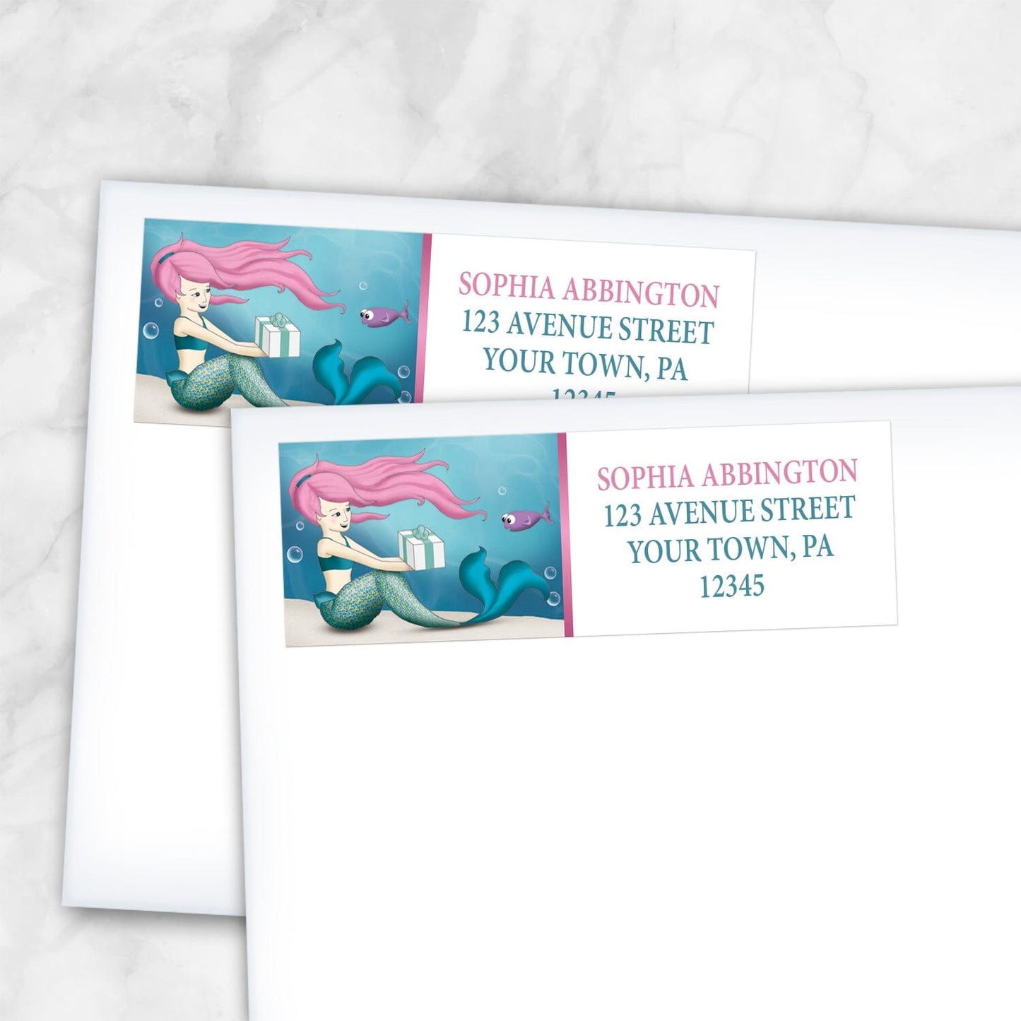 2 Under the Sea Mermaid Return Address Labels shown on white envelopes on a marble surface