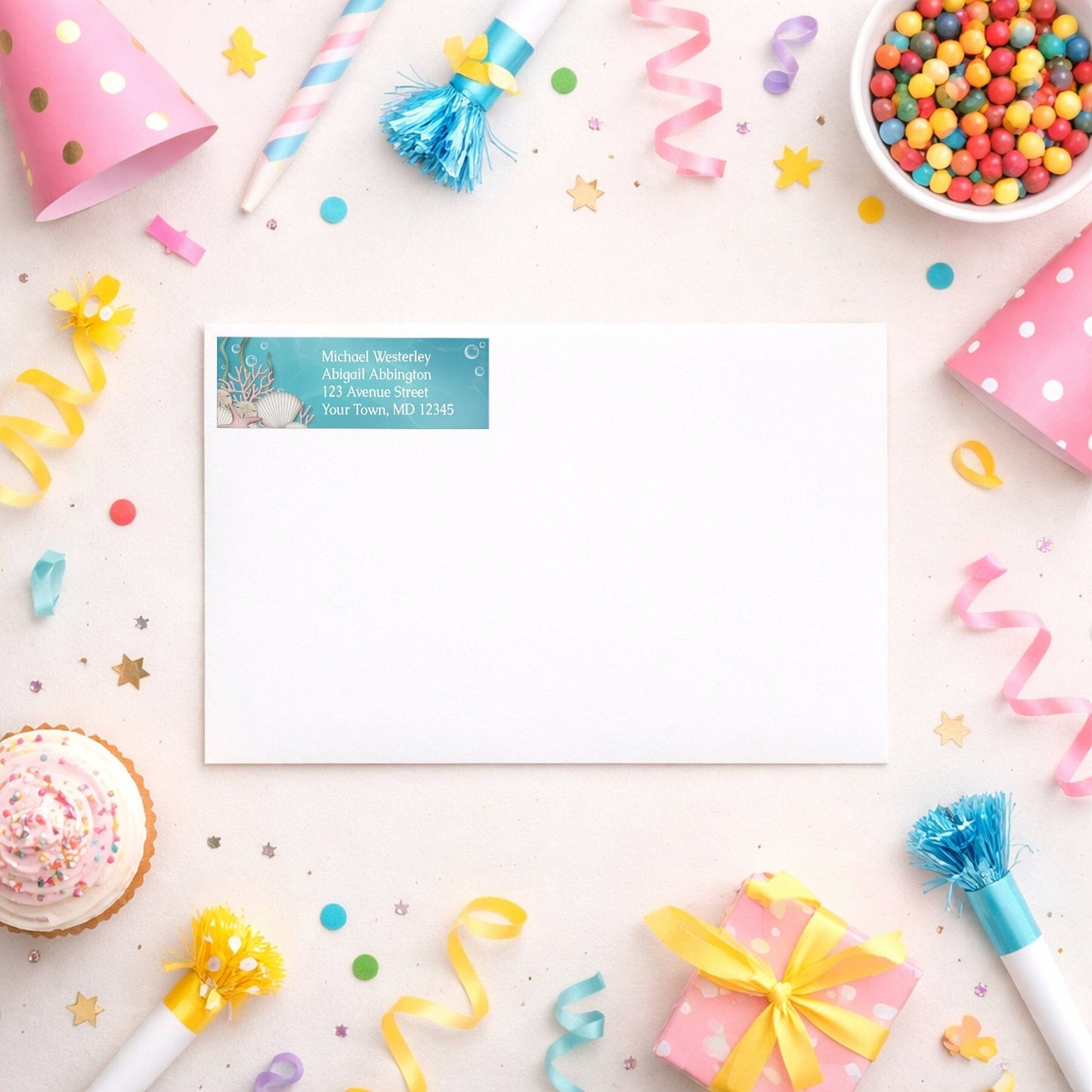 Whimsical Under the Sea Address Label shown on a white envelope with party supplies