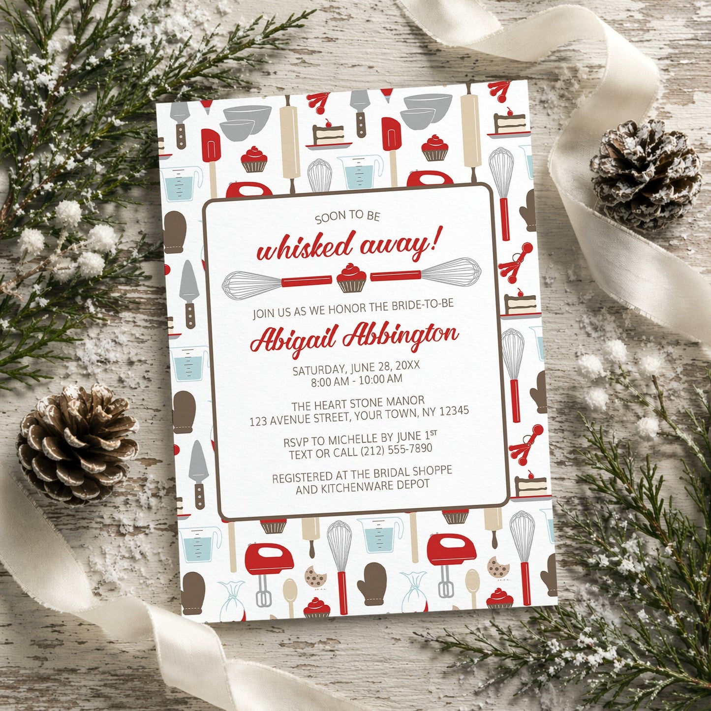 Whisked Away Red Baking Bridal Shower Invitation with kitchen-themed design on a decorative background with pine cones and ribbons.